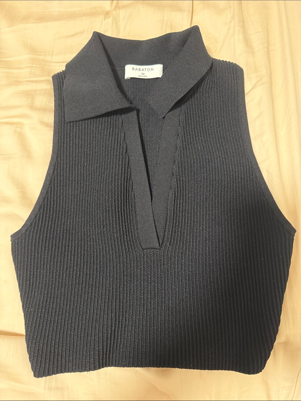 Babaton Black Ribbed Sleeveless Polo Crop Top